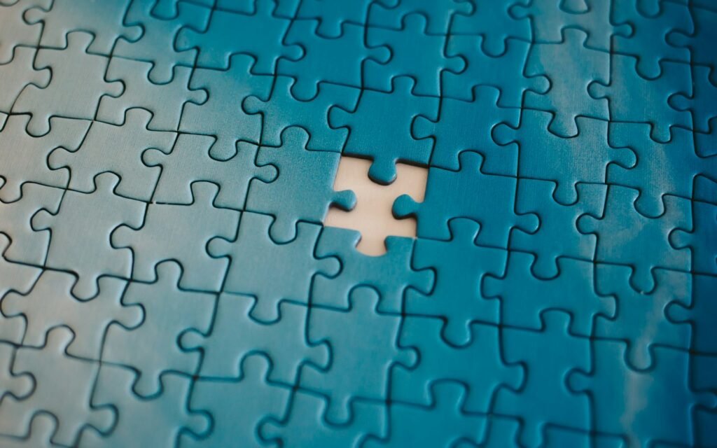 A piece of a puzzle with a missing piece