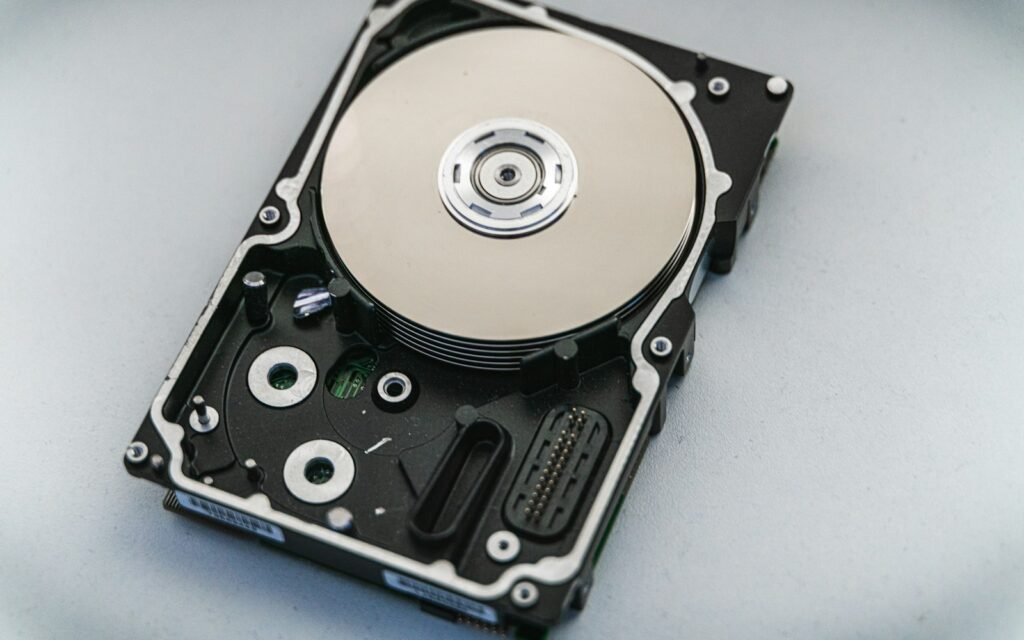 Silver and black hard disk drive